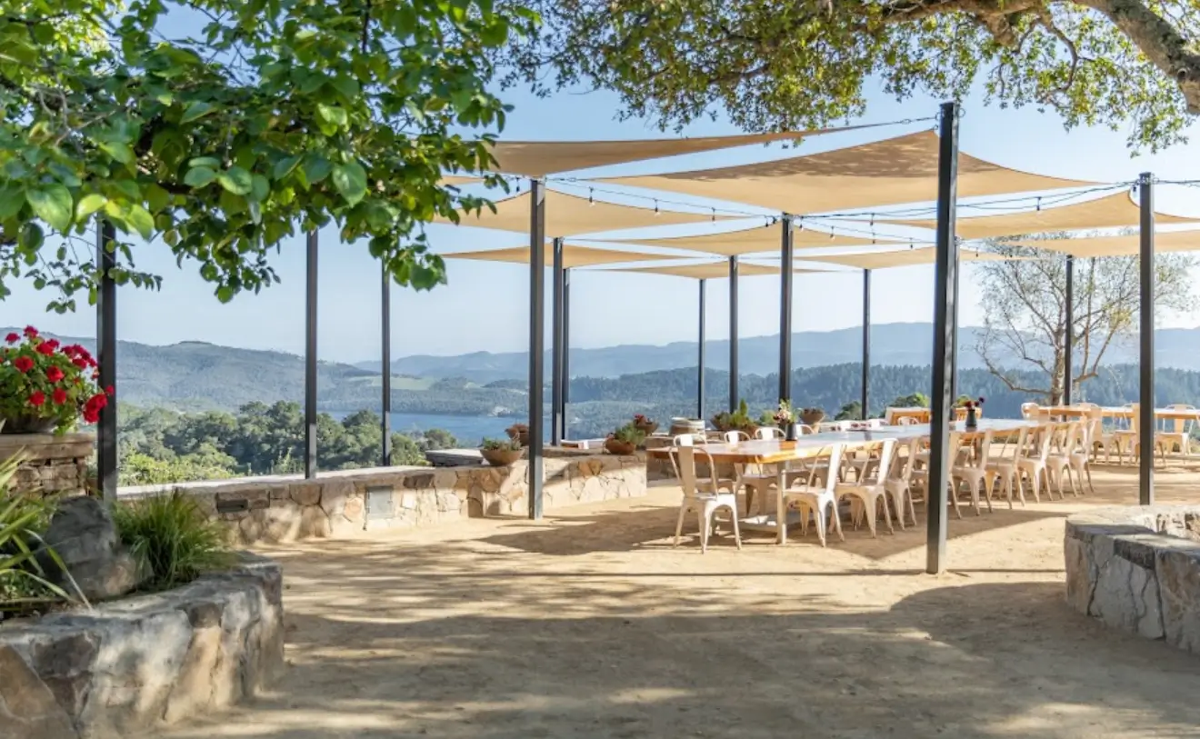 Event coordination on the outdoor tasting terrace at Amizetta Estate Winery in St. Helena, California